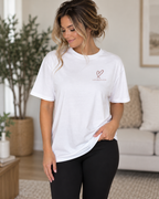 Model wearing the white Faith That Goes Beyond Sunday Classic Tee
